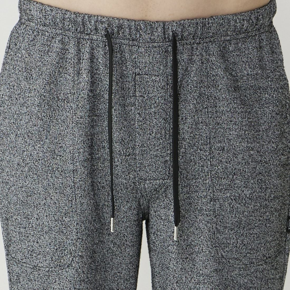 エポカ ウォモ 前開きロングリブテーパードパンツ