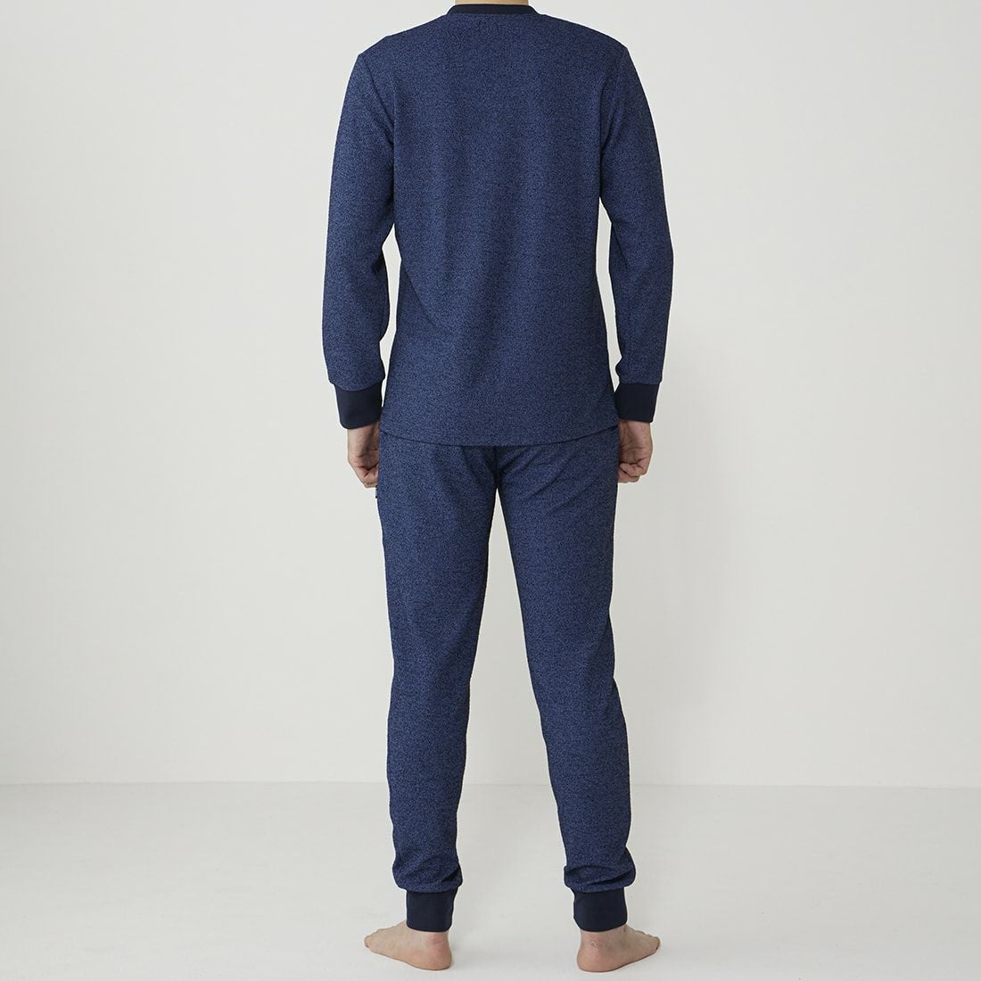 エポカ ウォモ 前開きロングリブテーパードパンツ