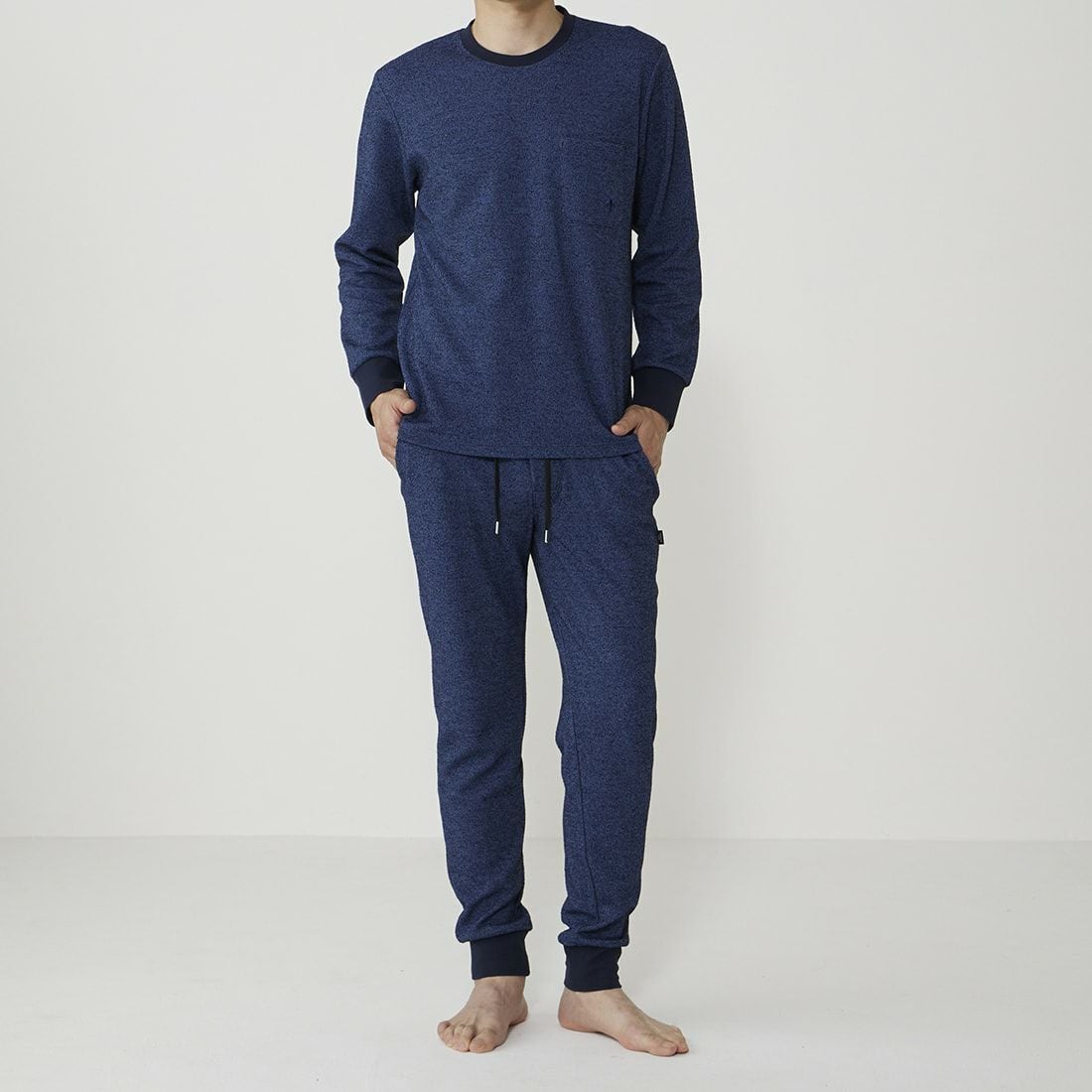 エポカ ウォモ 前開きロングリブテーパードパンツ