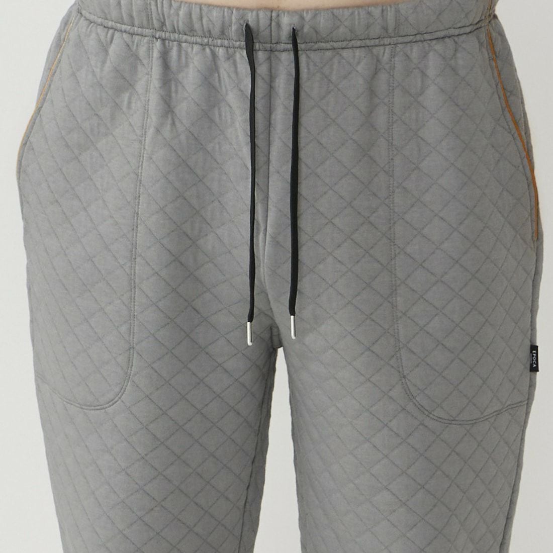 エポカ ウォモ 前閉ロングリブテーパードパンツ