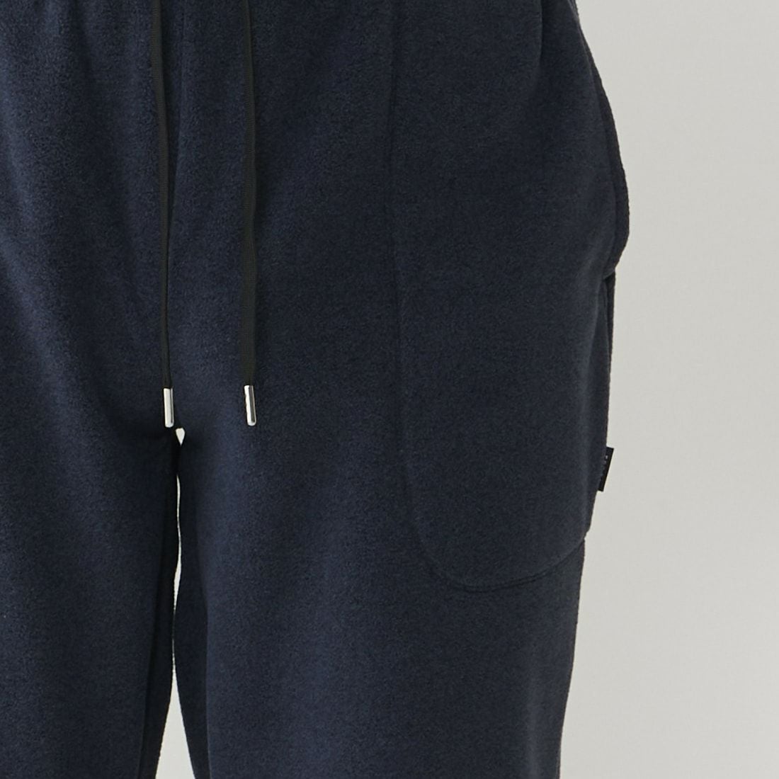 エポカ ウォモ 前閉ロングリブテーパードパンツ