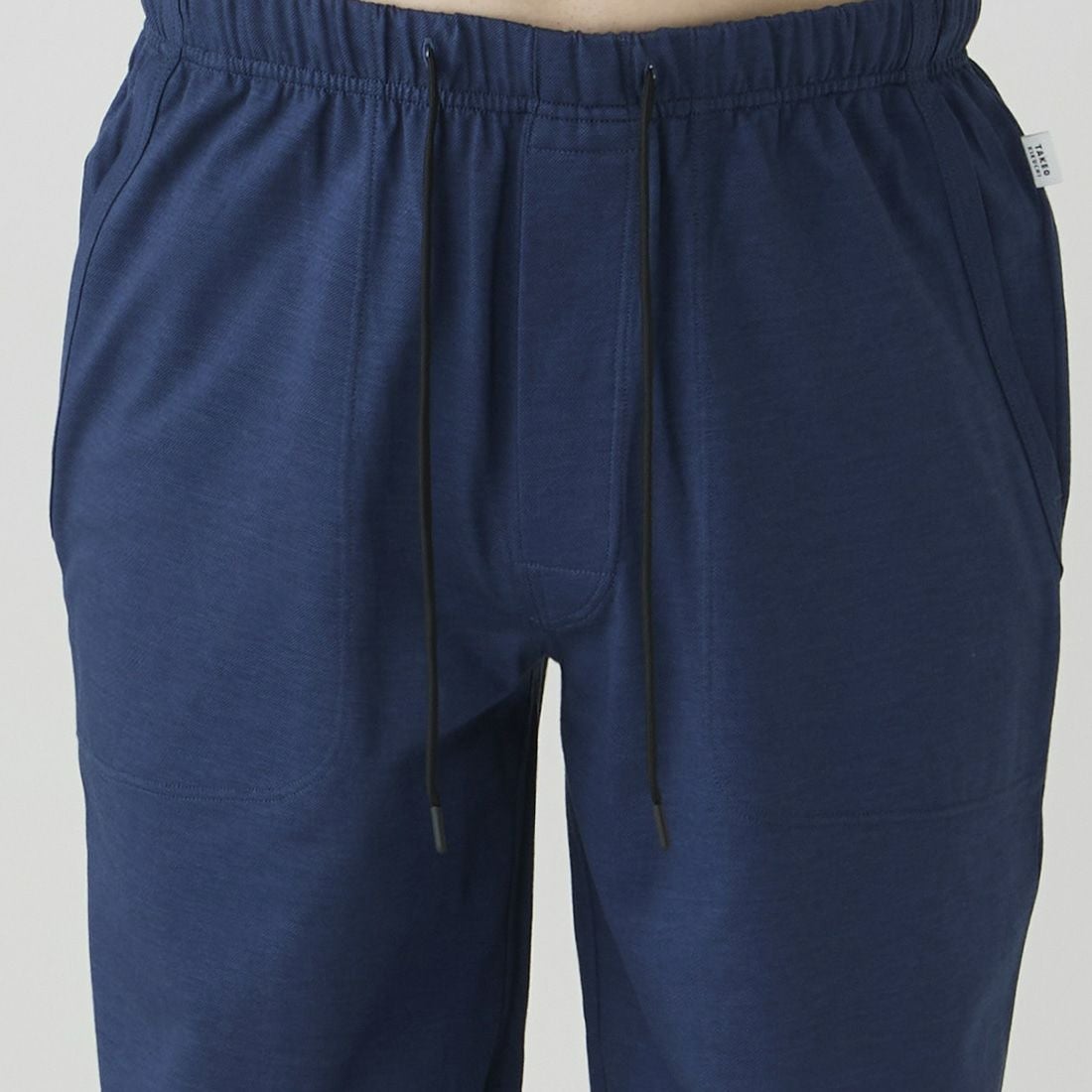 タケオキクチ 前開きロングテーパードパンツ